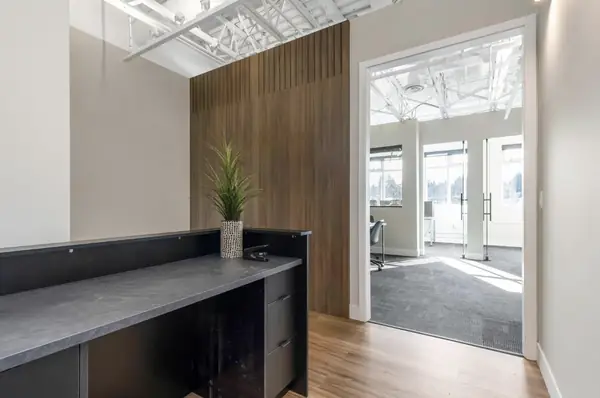 Reception desk with wood accent wall
